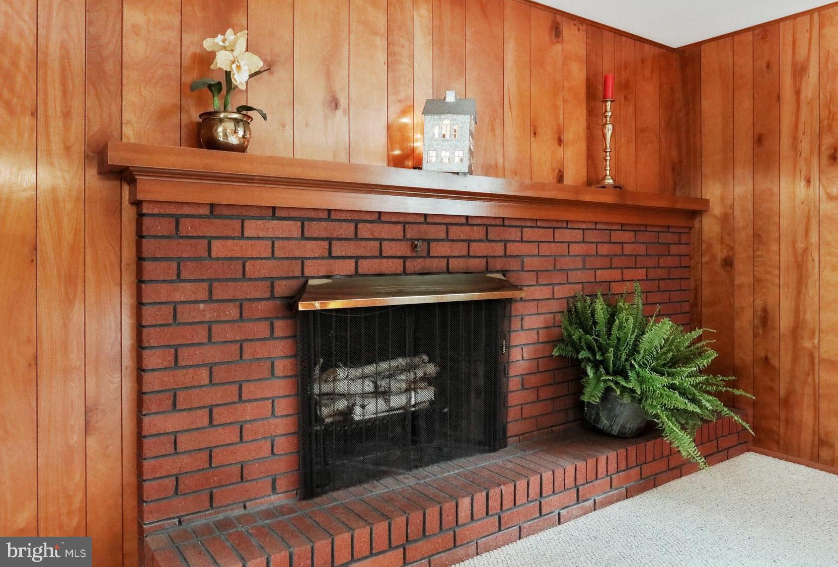 10600 Harry Heth Road Williamsport, MD 21795 - Photo 34 of 52 With Brick Wood Burning Fireplace and Large Mantel