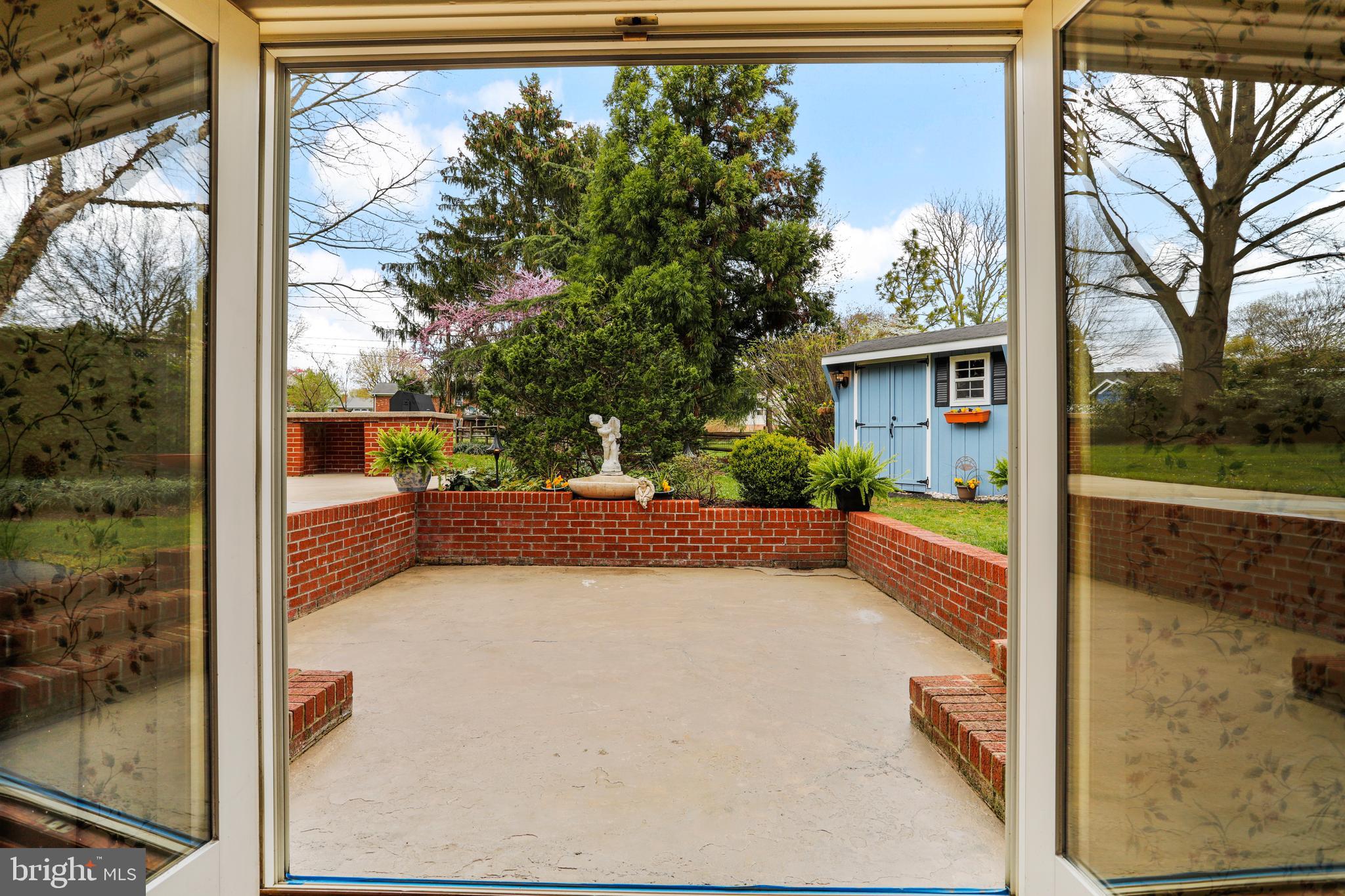 10600 Harry Heth Road Williamsport, MD 21795 - Photo 43 of 52 French Doors to Back Patio Entertaining Area, Yard