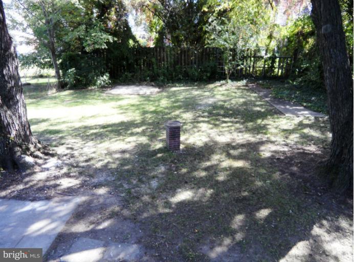 7402 Marston Road Baltimore, MD 21207 - Photo 22 of 24 a view of outdoor space with trees