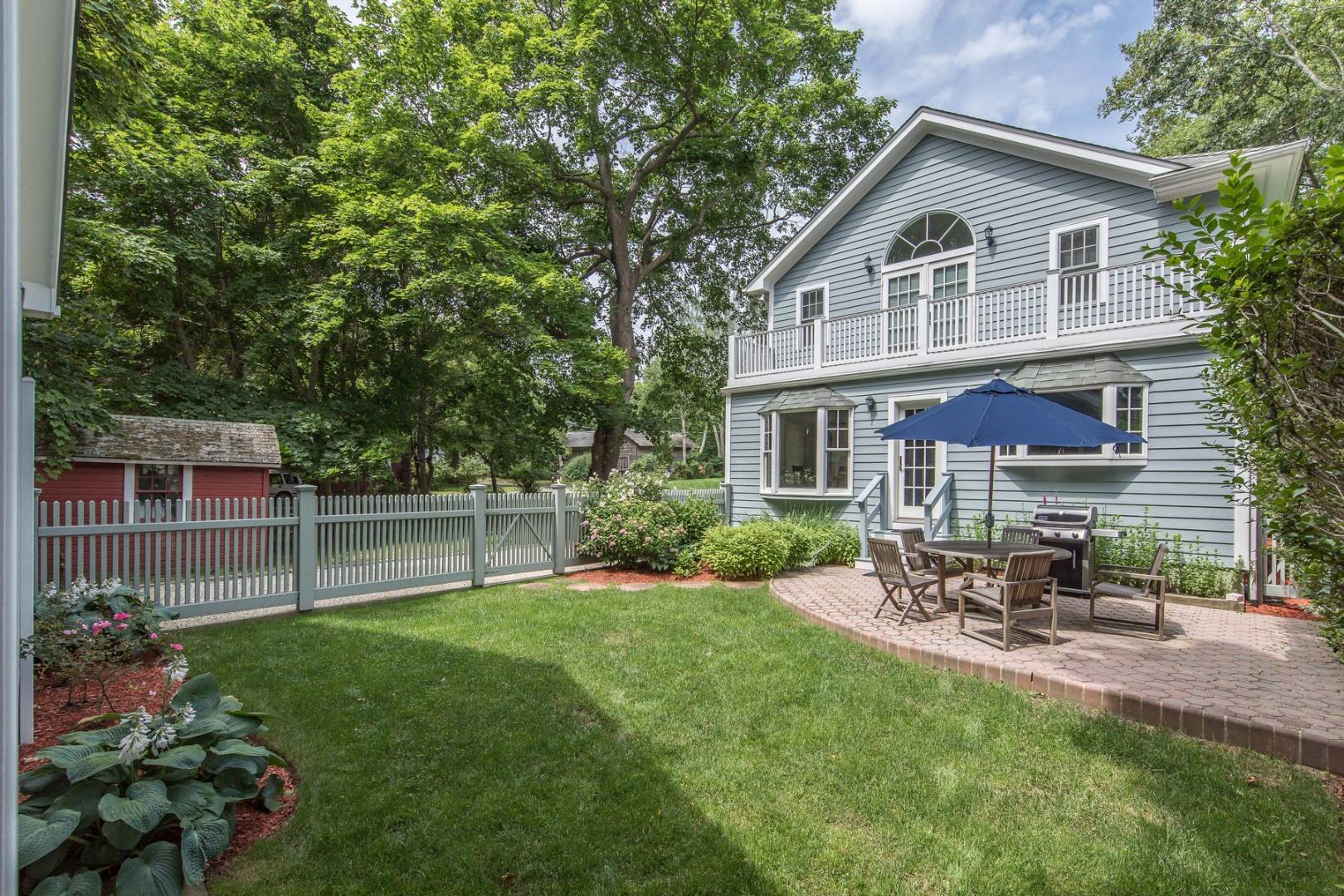 15 Hamilton Street Sag Harbor, NY 11963 - Photo 2 of 10 a house view with a sitting space and garden