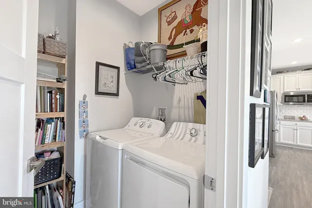 a utility room with dryer and washer