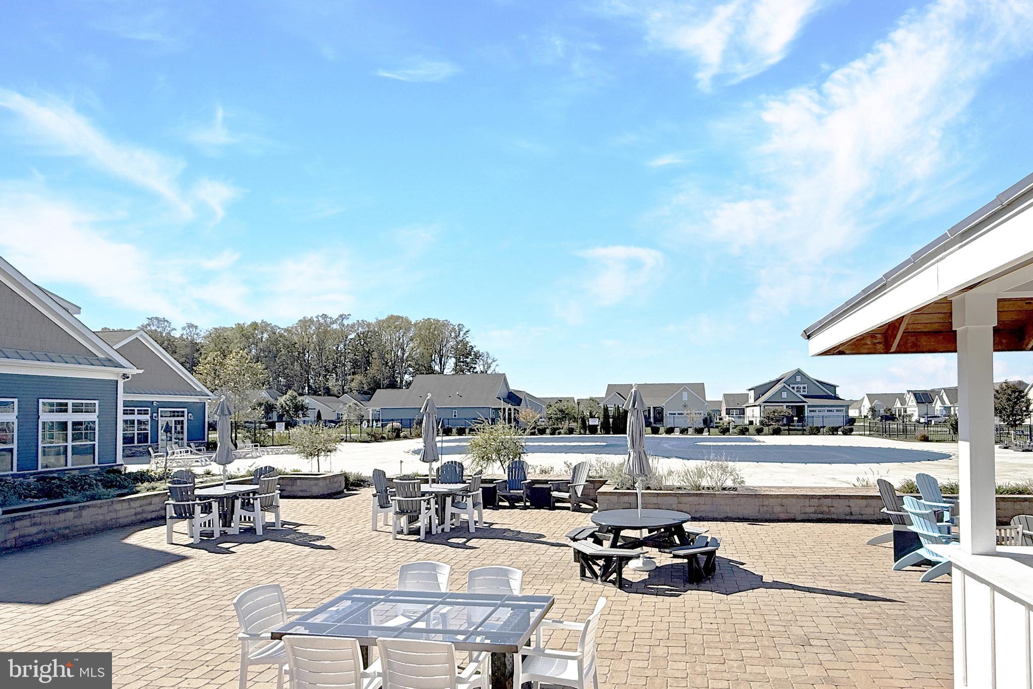 24901 Long Cove Court Millsboro, DE 19966 - Photo 20 of 23 a view of a terrace with sitting area