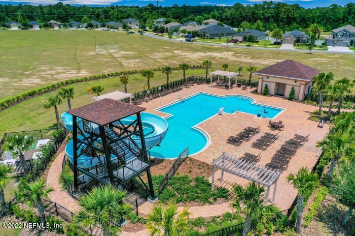 3807 Bronco Road Middleburg, FL 32068 - Photo 24 of 25 an aerial view of a house with outdoor space and lake view