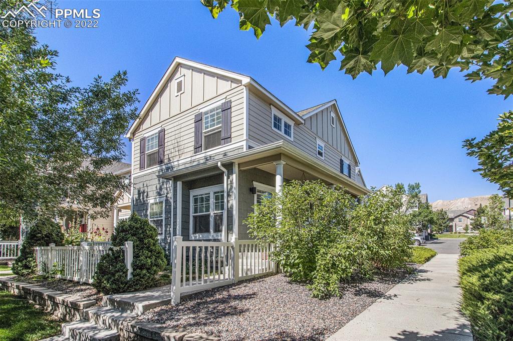 1472 Thunder Butte Road Castle Rock, CO 80109 - Photo 2 of 10 a front view of a house with garden