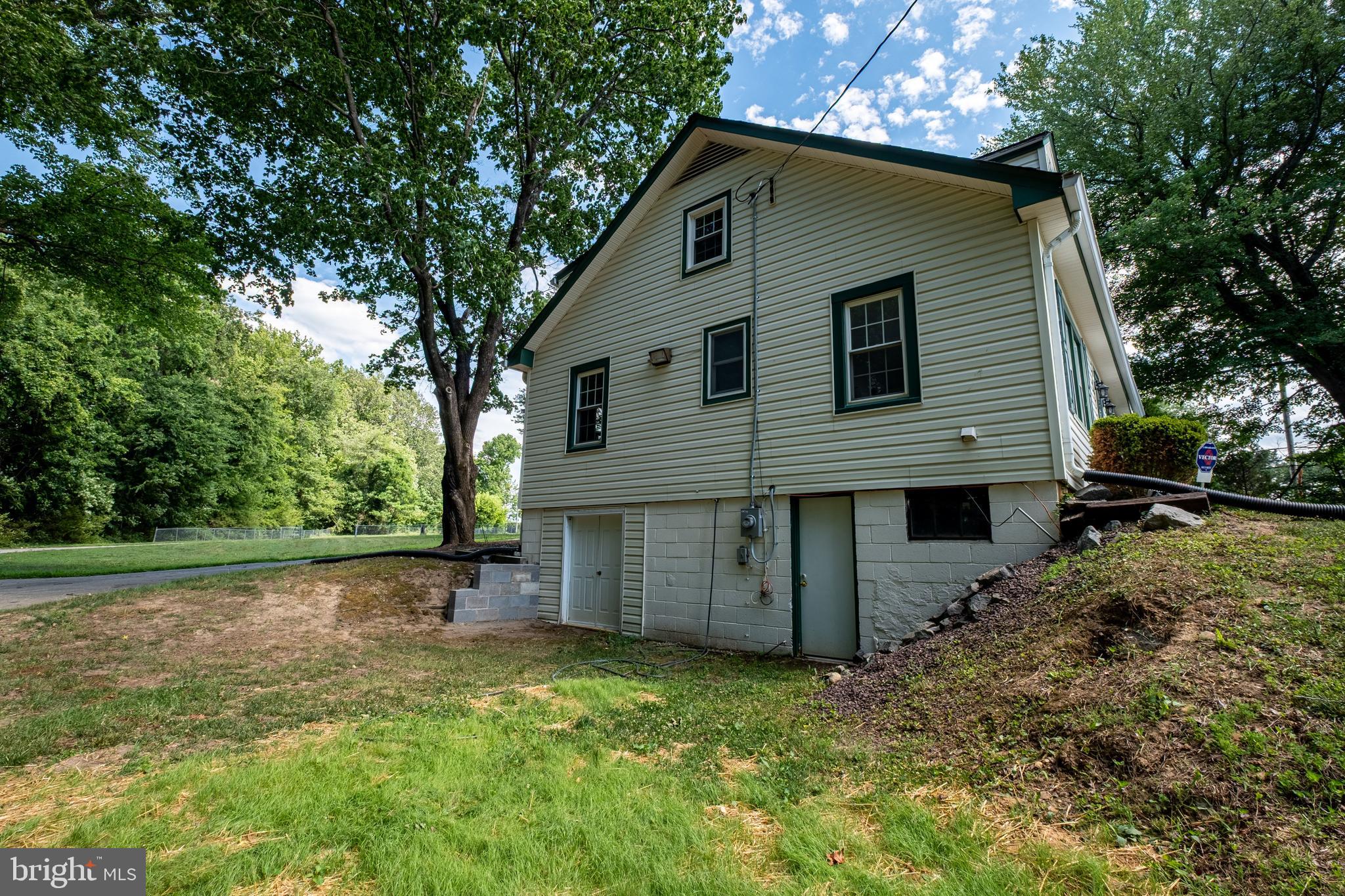 5680 Bryantown Road Bryantown, MD 20617 - Photo 2 of 33 a view of a house with a yard