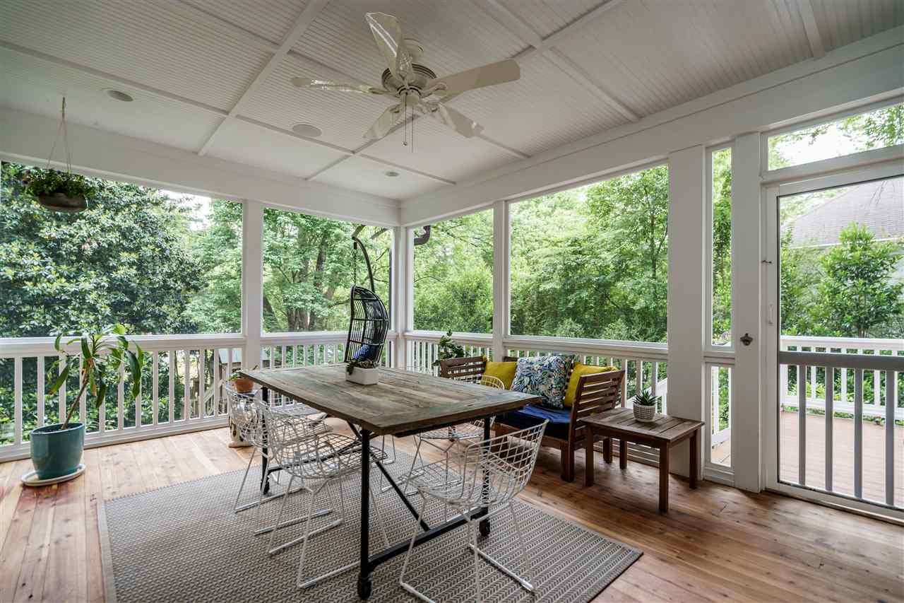 2713 Kilgore Avenue Raleigh, NC 27607 - Photo 26 of 30 Suitable for dining or chilling. The N.C. Cedar tongue in groove floors help make this extra room lovely. screened porch