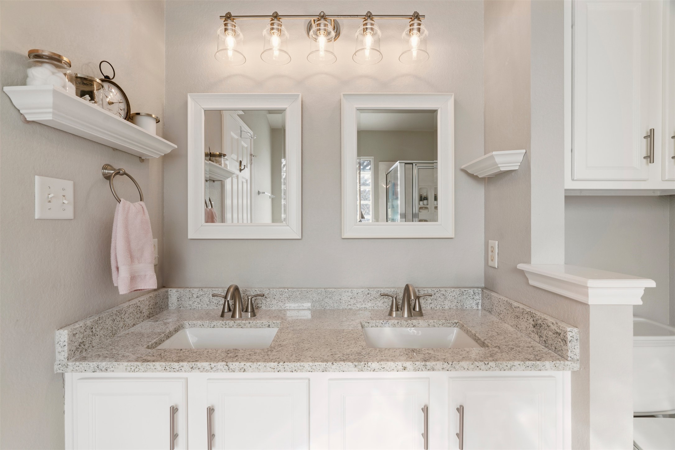 913 Bogart Road Cedar Park, TX 78613 - Photo 14 of 27 Bathroom with double vanity and a shower with shower door