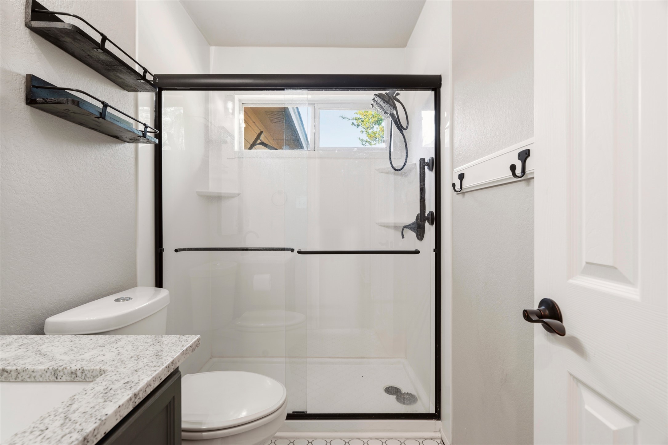 913 Bogart Road Cedar Park, TX 78613 - Photo 20 of 27 Bathroom featuring vanity and a stall shower