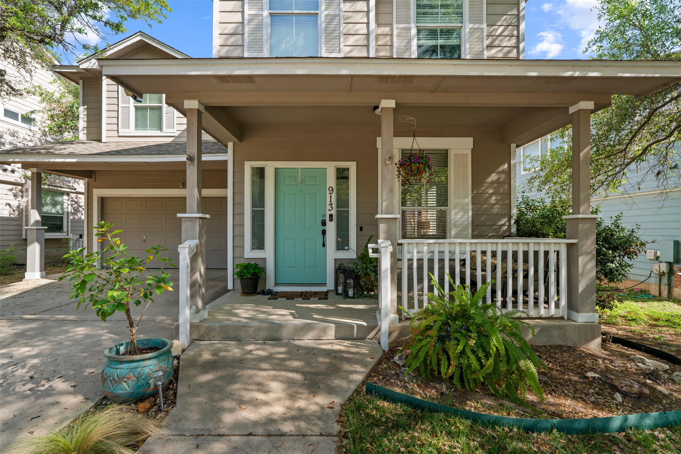 913 Bogart Road Cedar Park, TX 78613 - Photo 2 of 27 Property entrance featuring covered porch, driveway, and an attached garage
