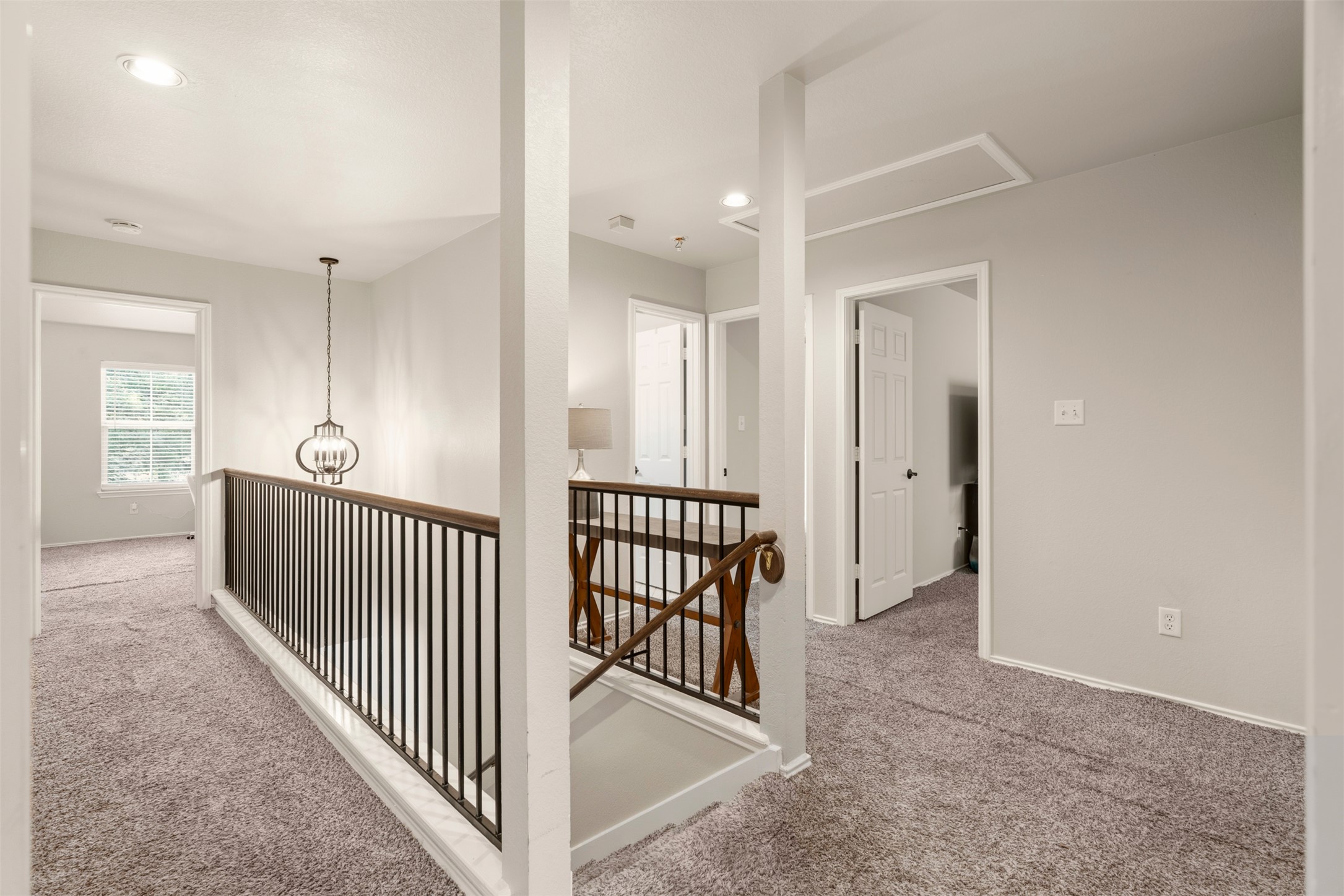 913 Bogart Road Cedar Park, TX 78613 - Photo 23 of 27 Corridor featuring carpet flooring, an upstairs landing, and recessed lighting