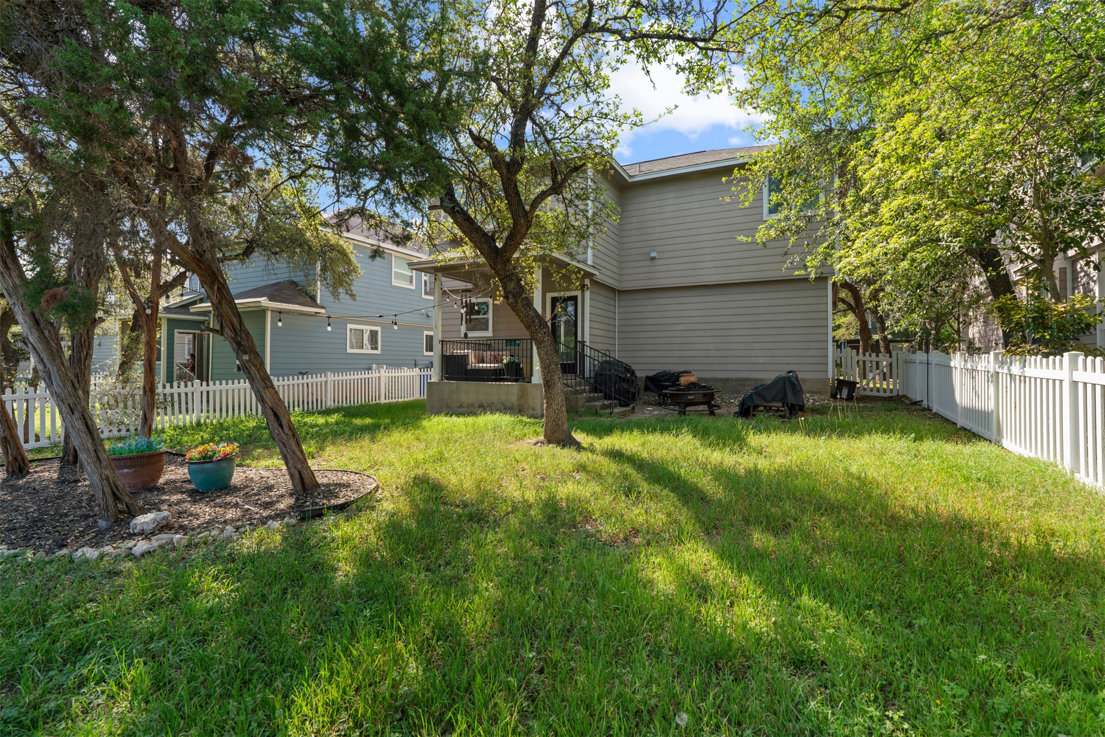913 Bogart Road Cedar Park, TX 78613 - Photo 25 of 27 Back of house with a fenced backyard
