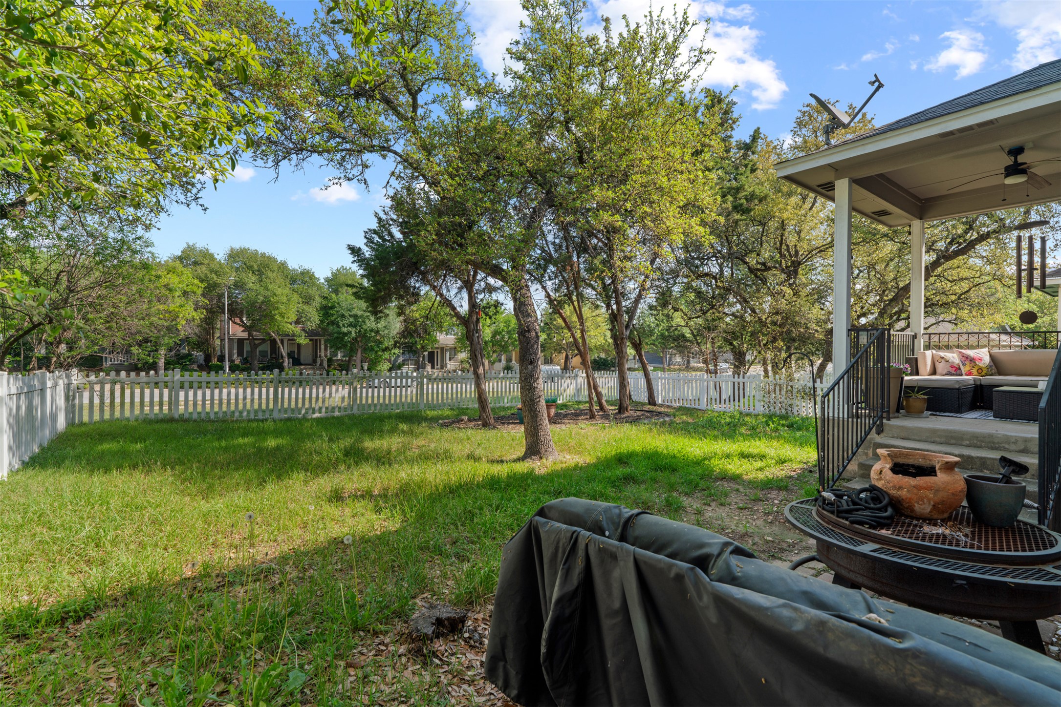 913 Bogart Road Cedar Park, TX 78613 - Photo 27 of 27 Fenced backyard with an outdoor living space, a patio, and a ceiling fan