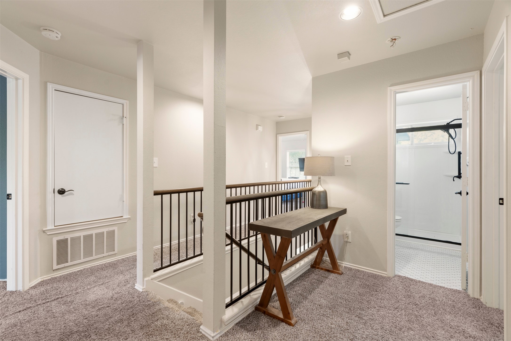 913 Bogart Road Cedar Park, TX 78613 - Photo 10 of 27 Hallway with light carpet, an upstairs landing, and recessed lighting