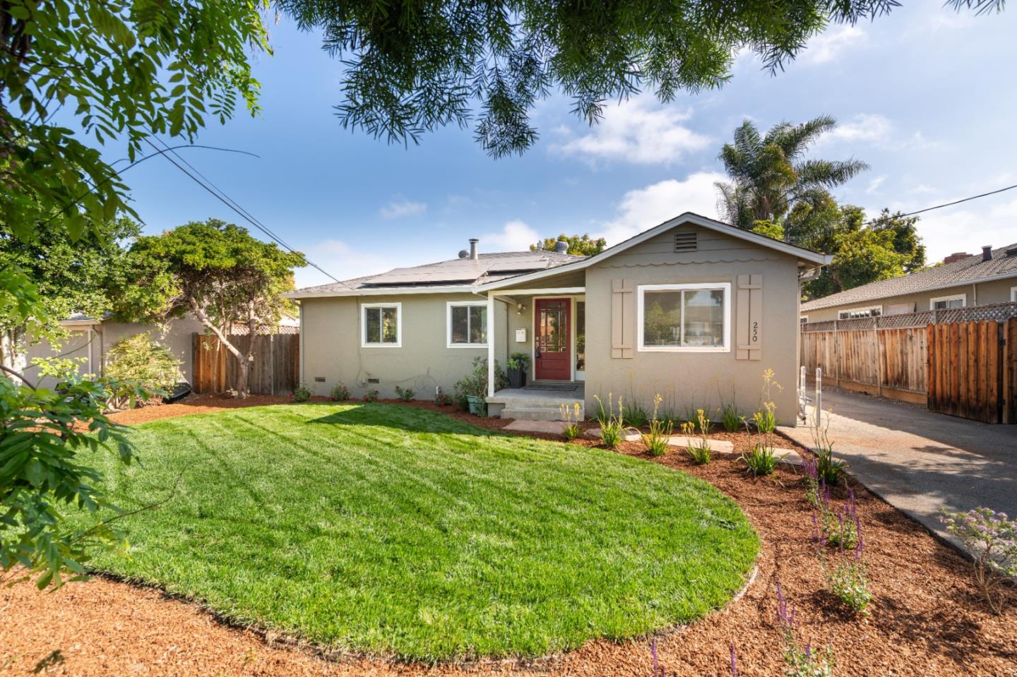 250 Vincent Drive Mountain View, CA 94041 - Photo 1 of 23 a backyard of a house with table and chairs
