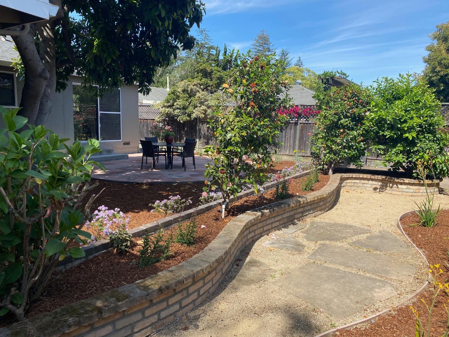 250 Vincent Drive Mountain View, CA 94041 - Photo 16 of 23 a view of a swimming pool with a patio