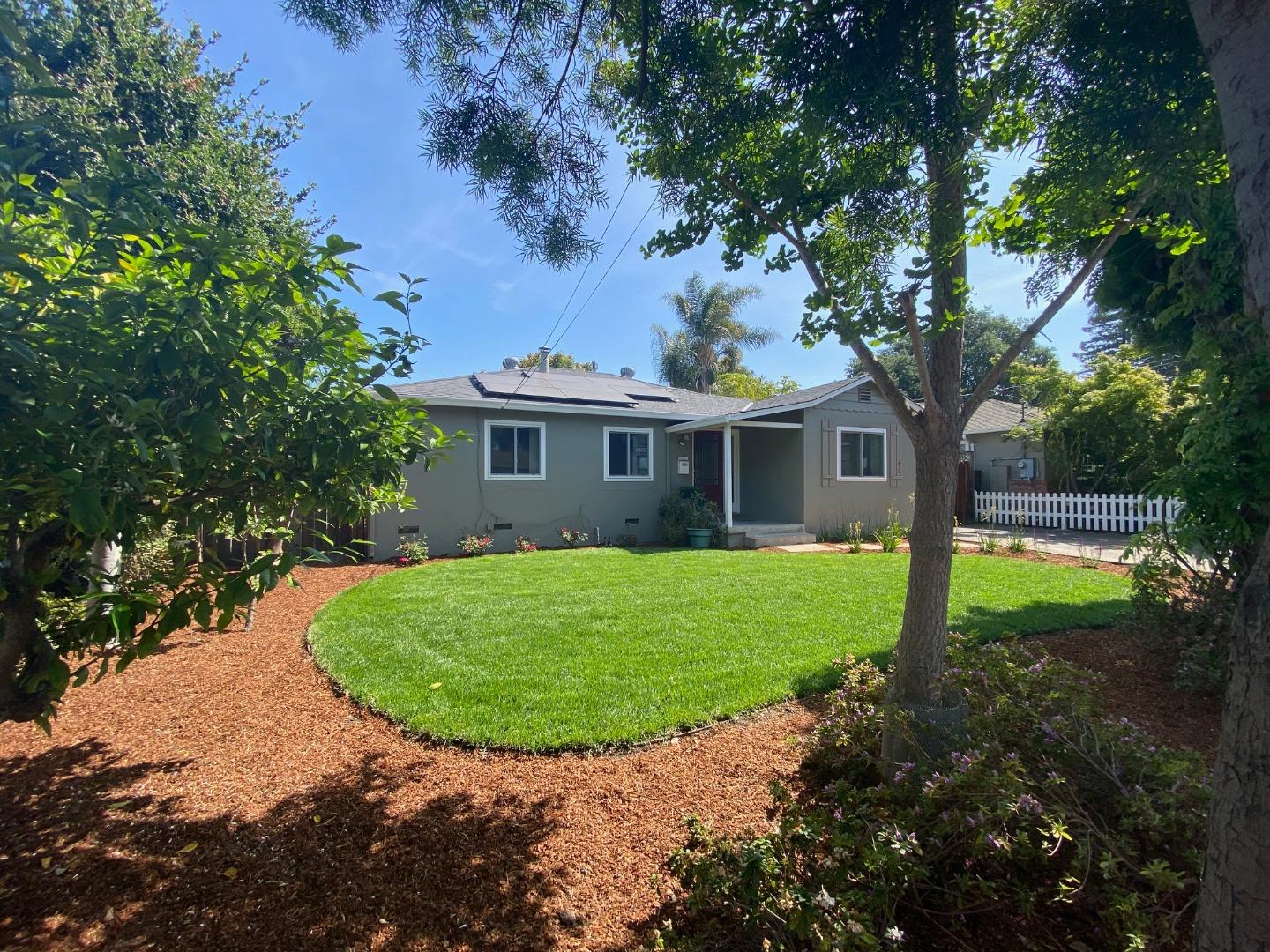 250 Vincent Drive Mountain View, CA 94041 - Photo 2 of 23 a front view of a house with a yard