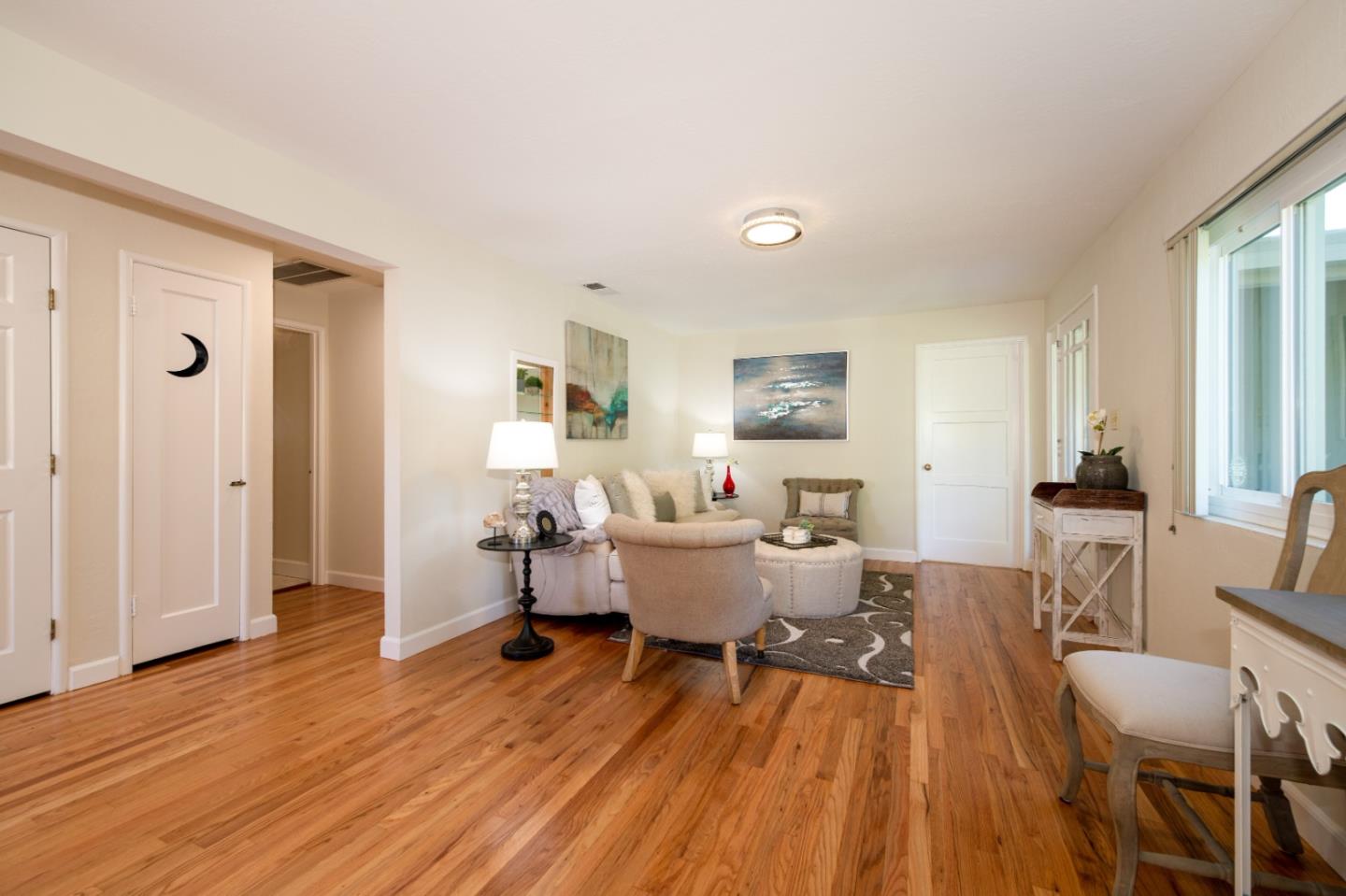 250 Vincent Drive Mountain View, CA 94041 - Photo 5 of 23 a living room with furniture and a wooden floor