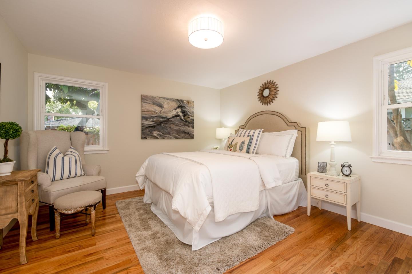 250 Vincent Drive Mountain View, CA 94041 - Photo 10 of 23 a bedroom with a bed and a chair