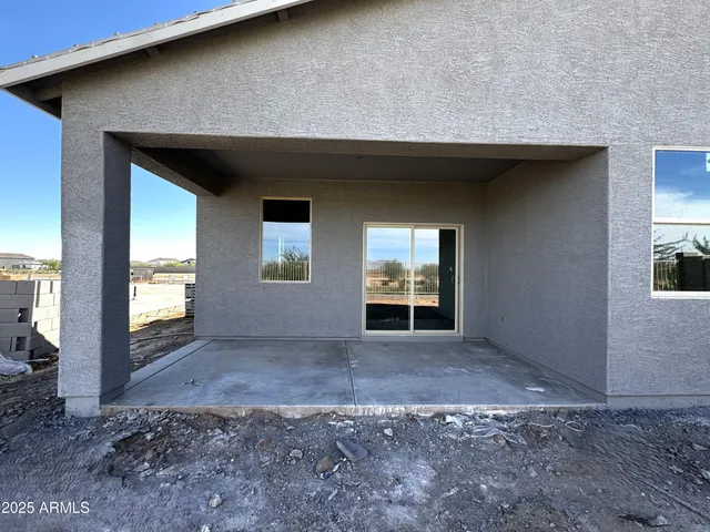 a view of backyard of house