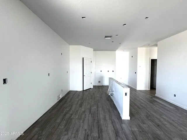 a view of kitchen with wooden floor