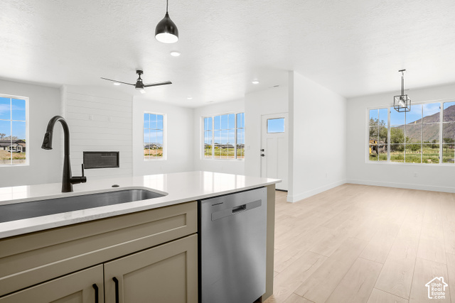 1631 West Century Lane, Unit B Mapleton, UT 84664 - Photo 7 of 23 Granite Kitchen island with an undermount sink and matte black faucet