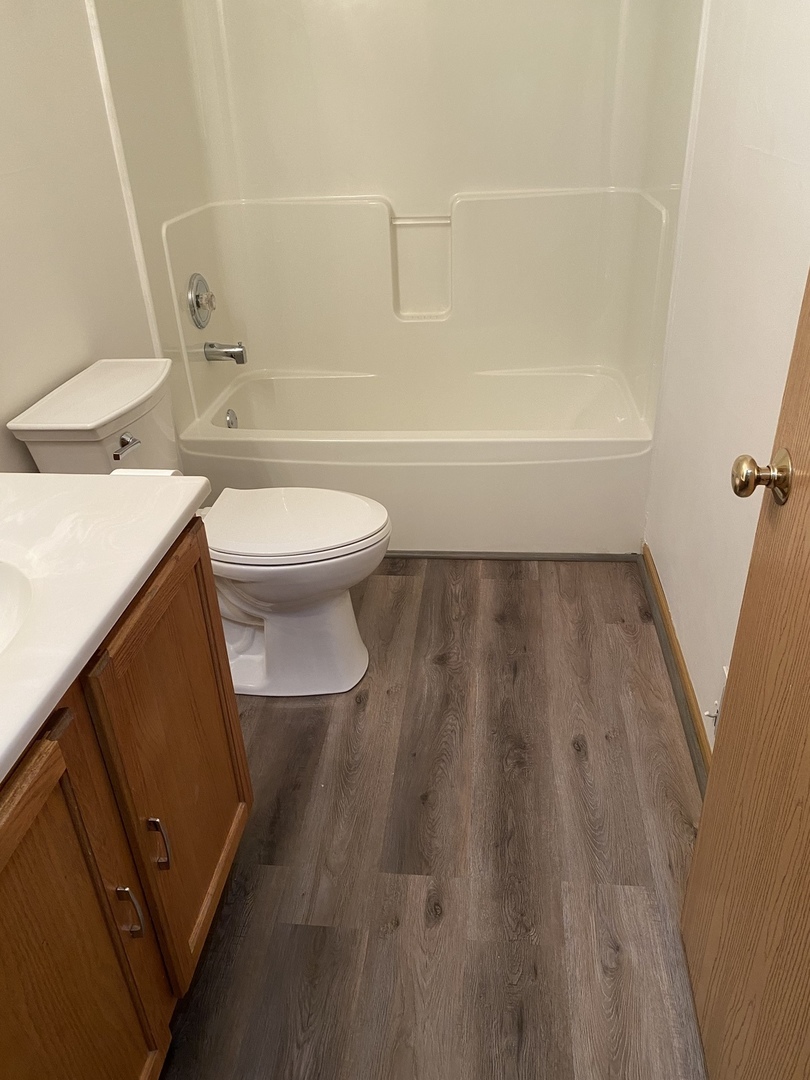 922 North Springfield Avenue Chicago, IL 60651 - Photo 32 of 47 a bathroom with a sink and a toilet