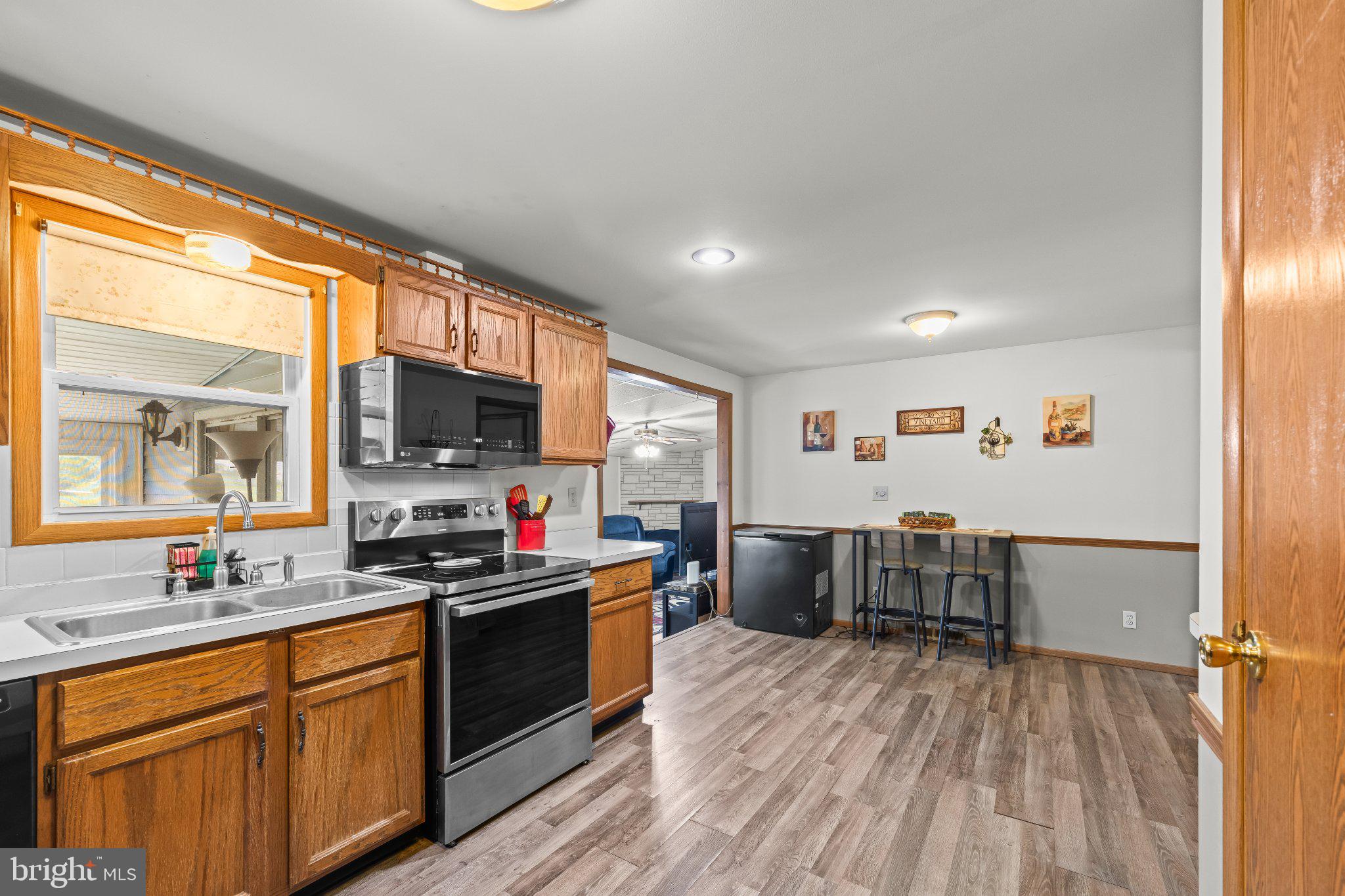 9 Raspberry Drive Mechanicsburg, PA 17050 - Photo 13 of 30 Modern kitchen with warm wood accents.
