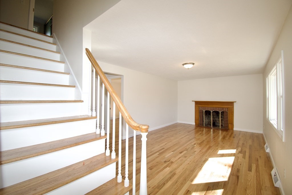 812 Maple Road Longmeadow, MA 01106 - Photo 8 of 22 a view of entryway and hall with wooden floor