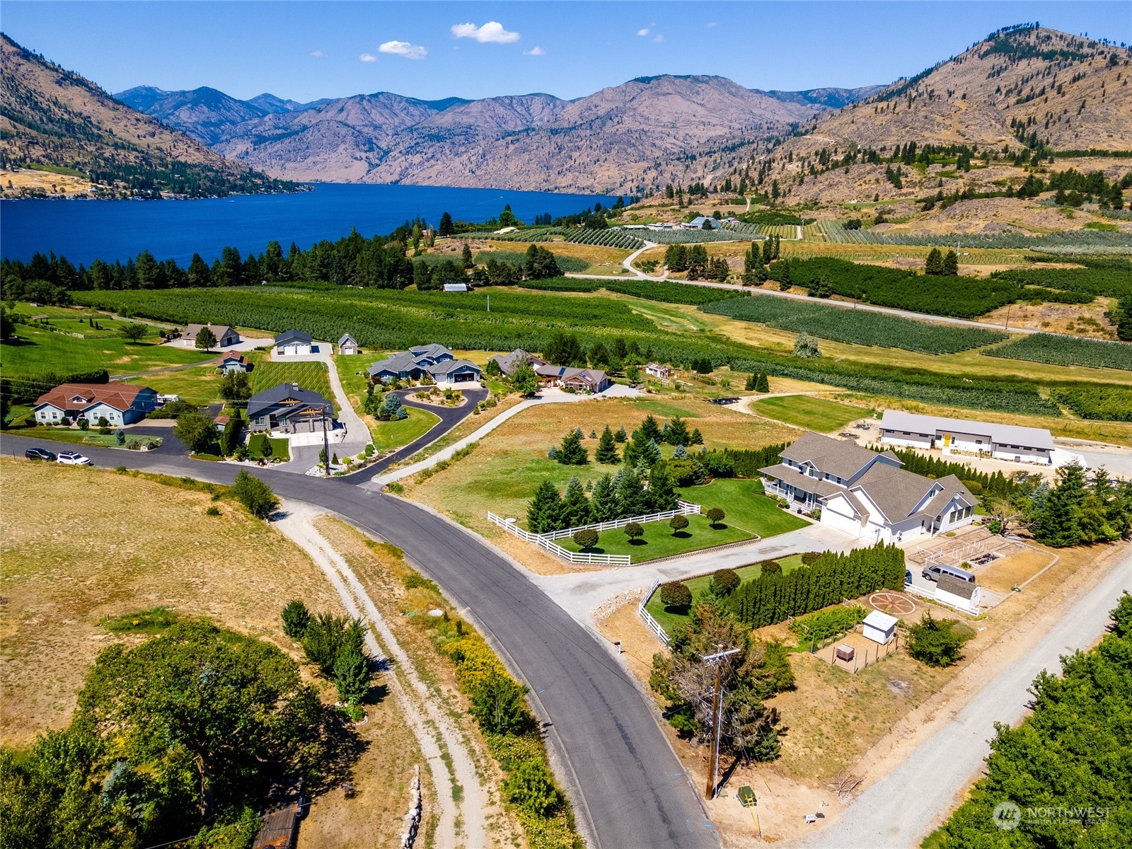 900 Loop Avenue Manson, WA 98831 - Photo 1 of 40 a view of a city with a mountain