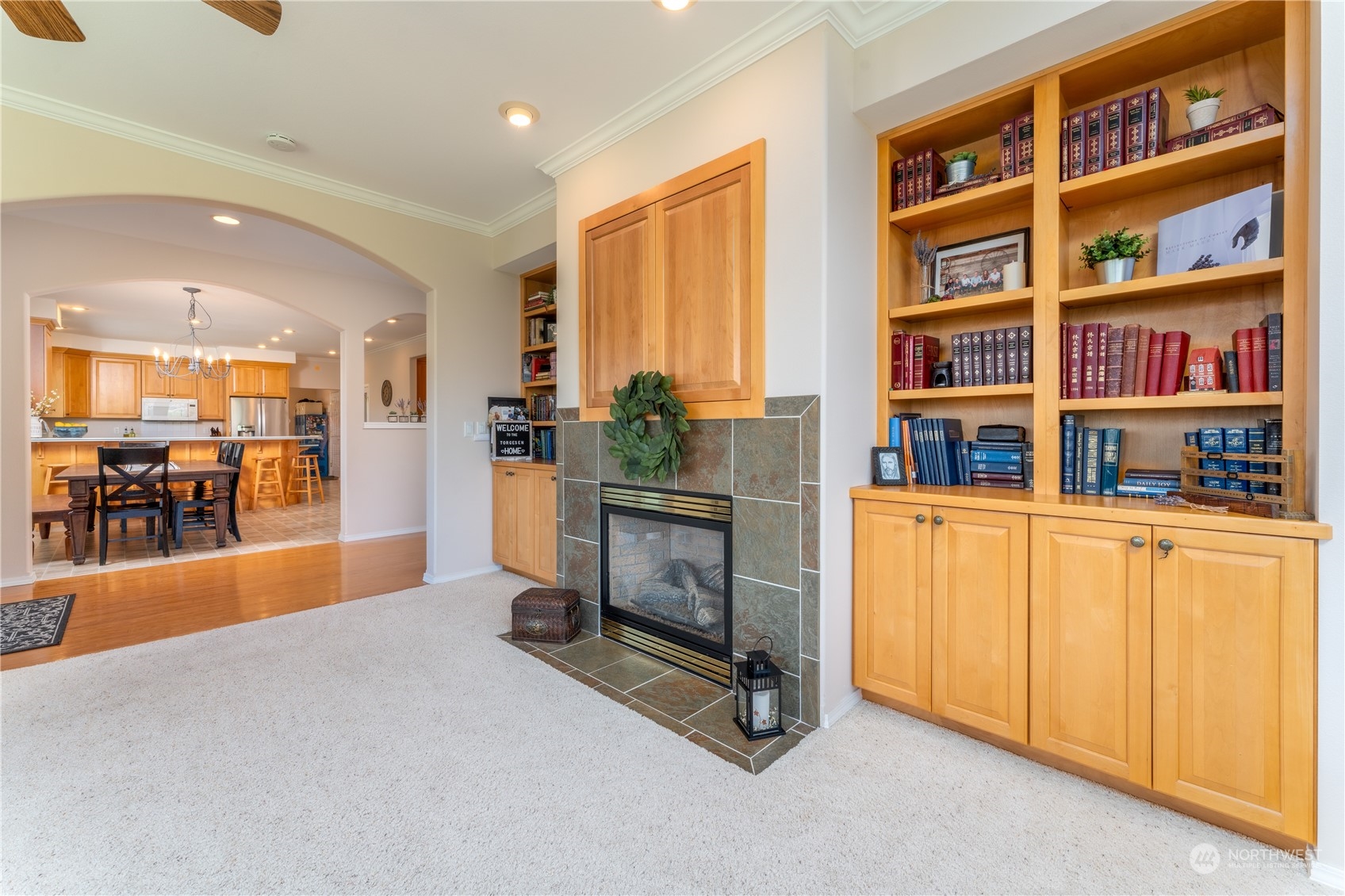900 Loop Avenue Manson, WA 98831 - Photo 14 of 40 a living room with fish tank and a bookshelf