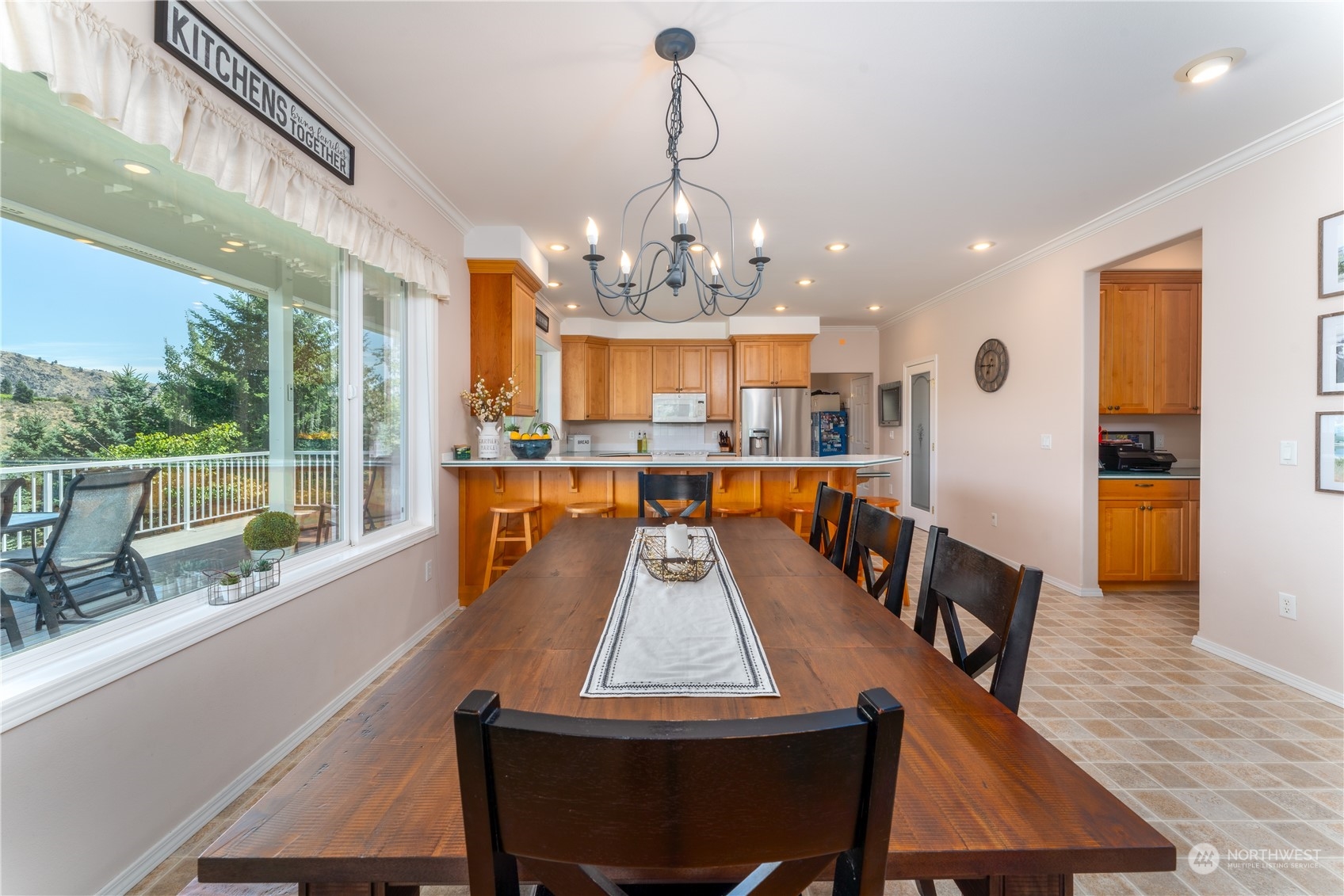 900 Loop Avenue Manson, WA 98831 - Photo 15 of 40 a view of a dining room with furniture large window and wooden floor