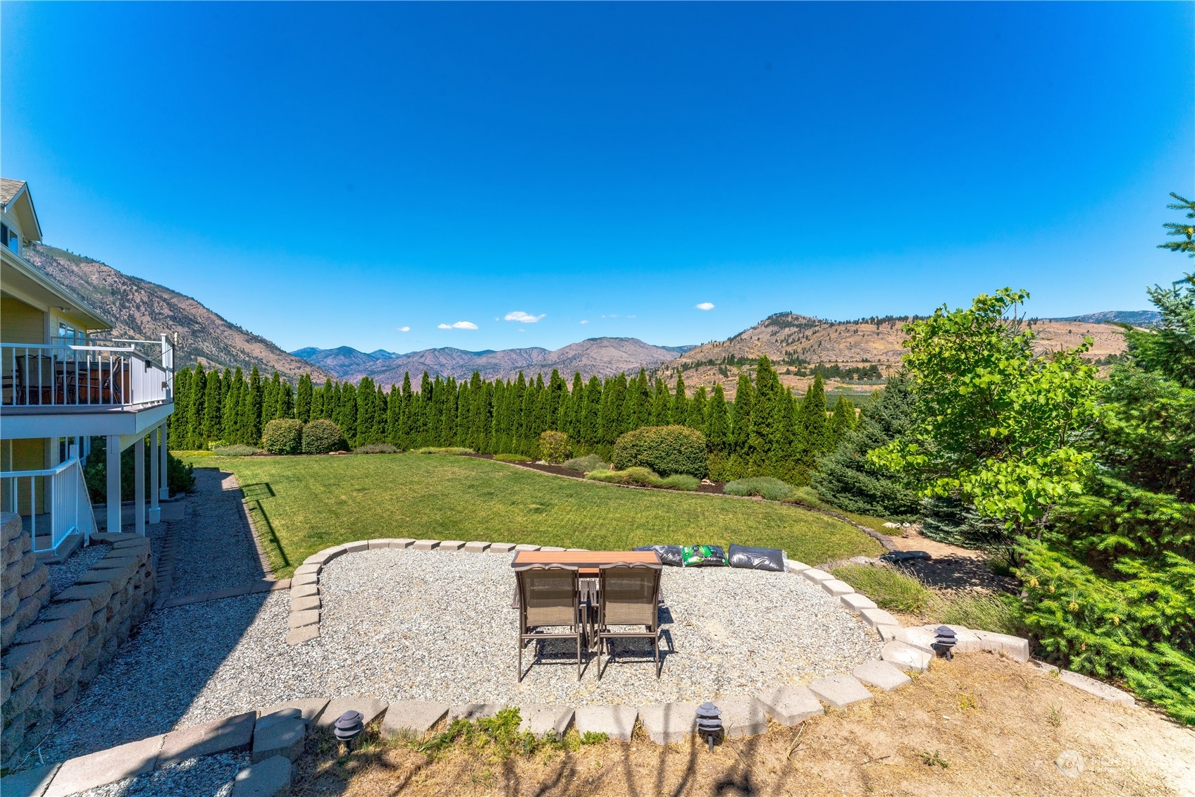 900 Loop Avenue Manson, WA 98831 - Photo 17 of 40 a view of a garden with patio