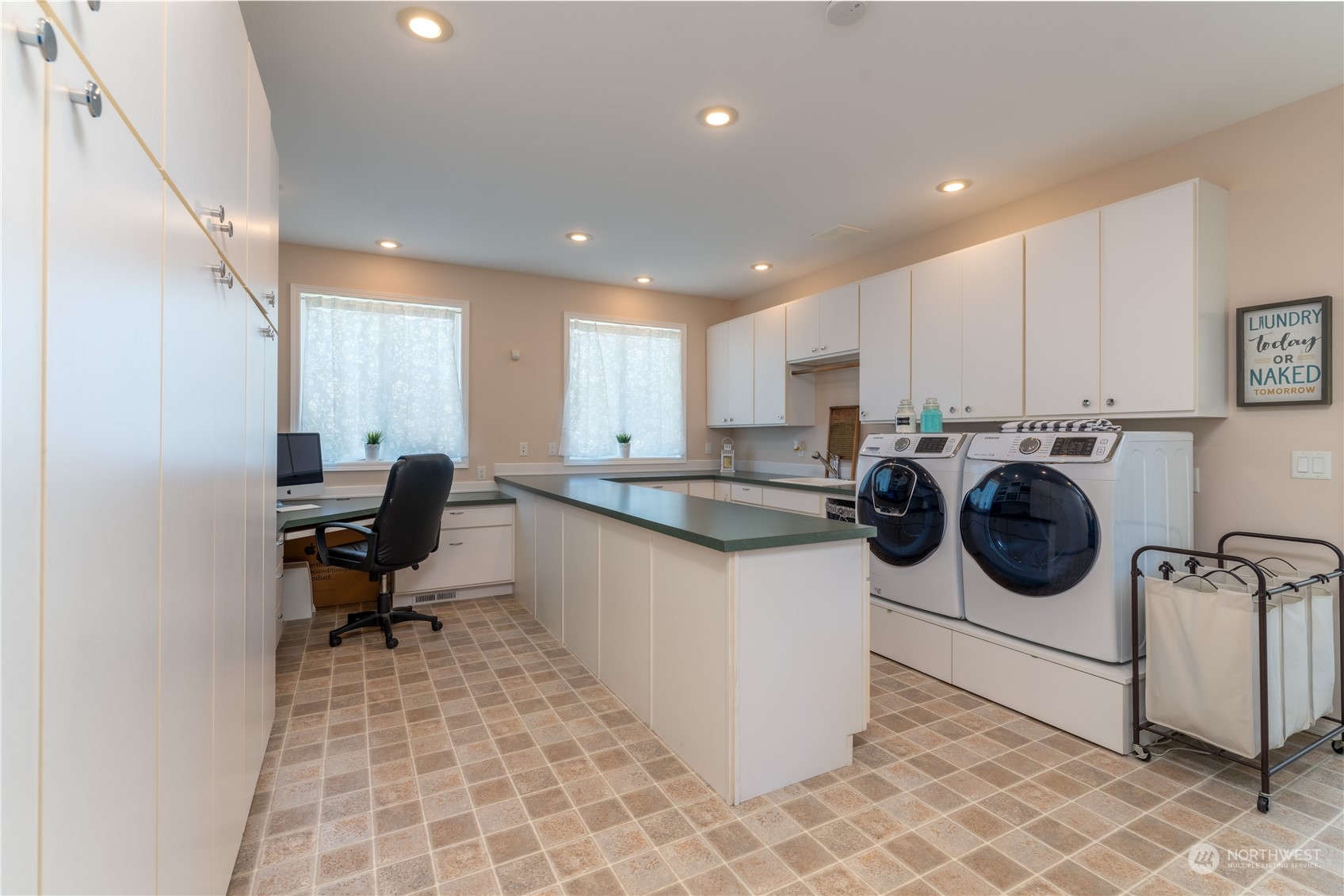 900 Loop Avenue Manson, WA 98831 - Photo 21 of 40 a kitchen with a sink cabinets and washing machine