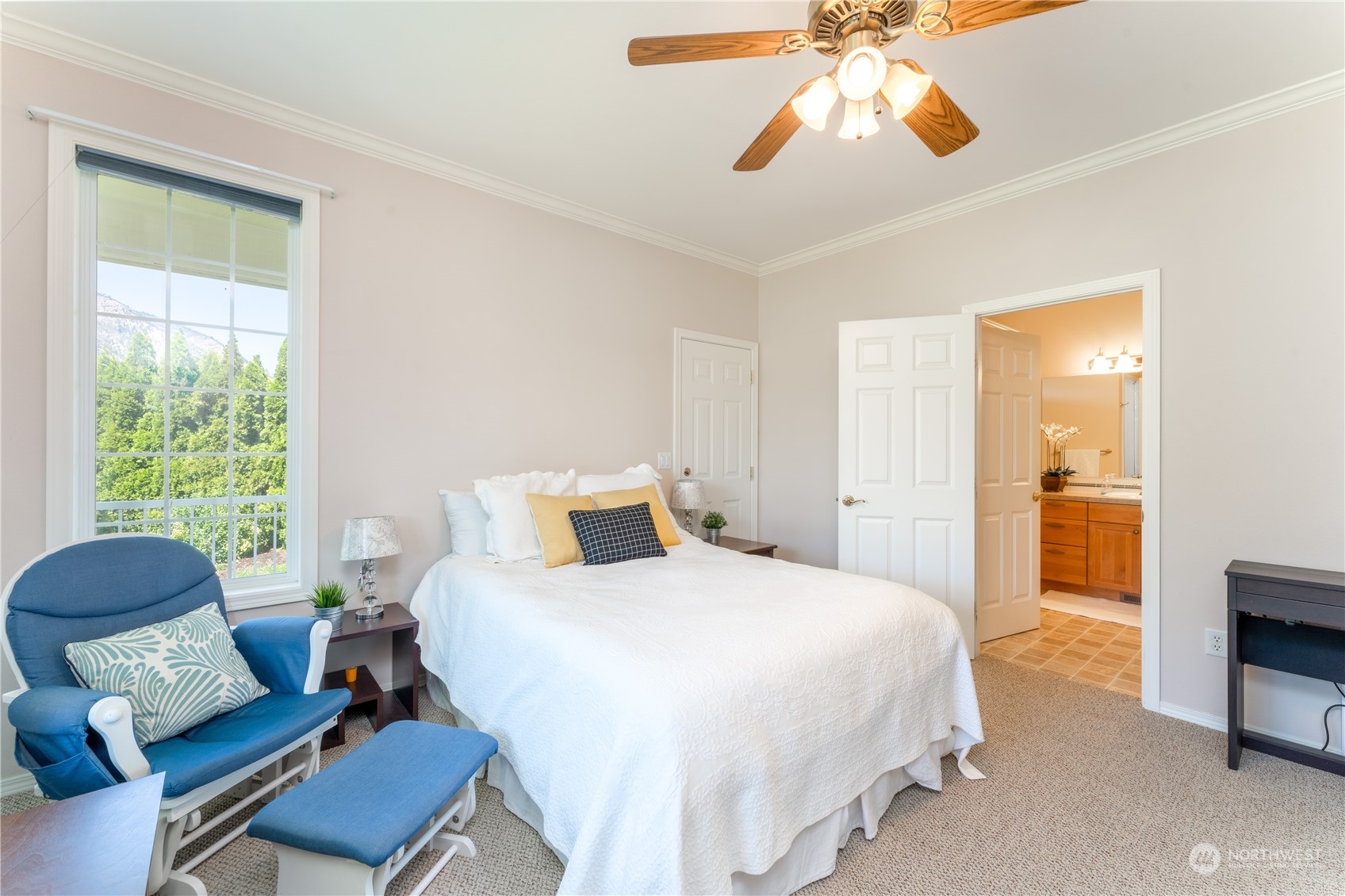 900 Loop Avenue Manson, WA 98831 - Photo 23 of 40 a bedroom with a bed and wooden floor