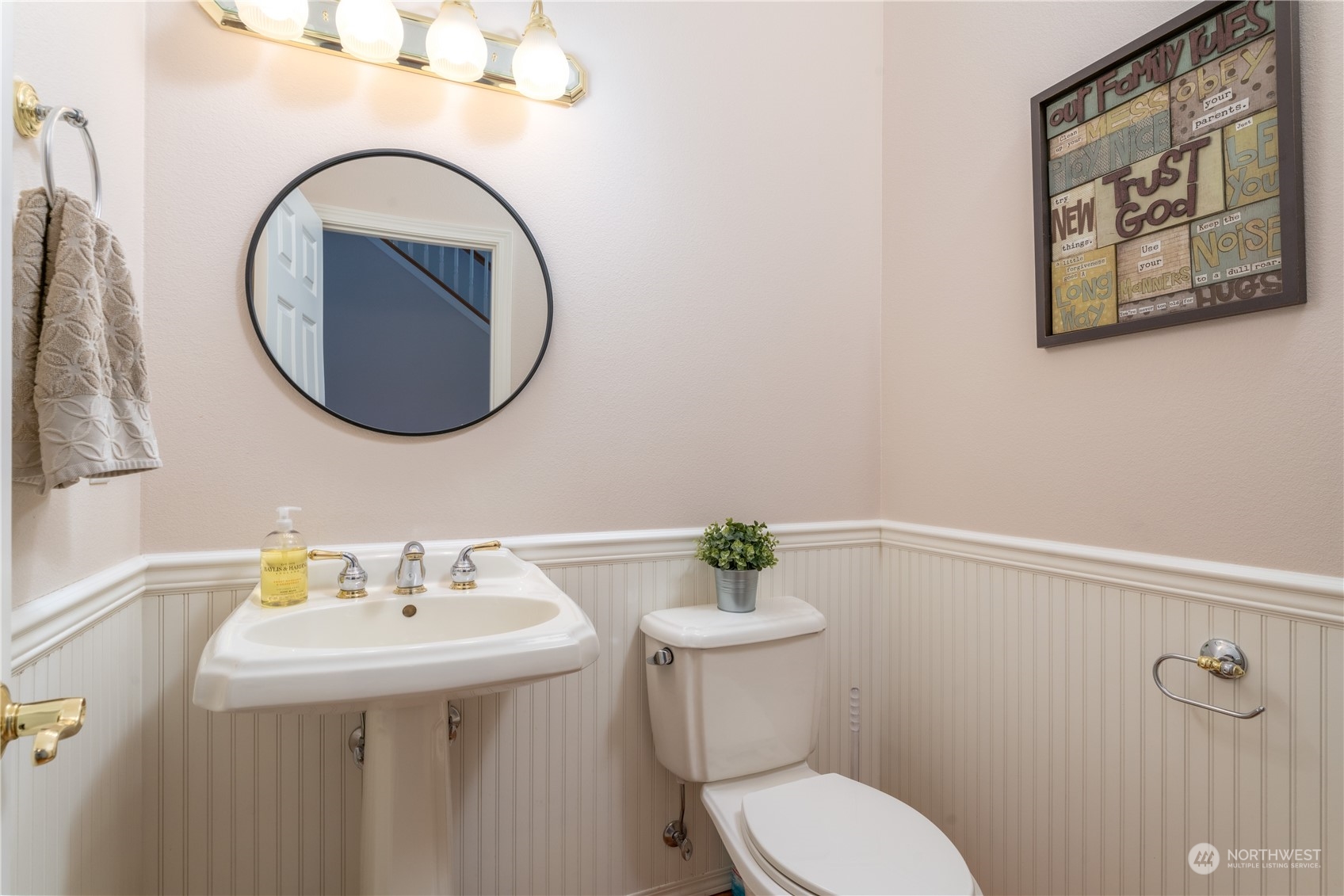 900 Loop Avenue Manson, WA 98831 - Photo 26 of 40 a bathroom with a sink mirror and toilet