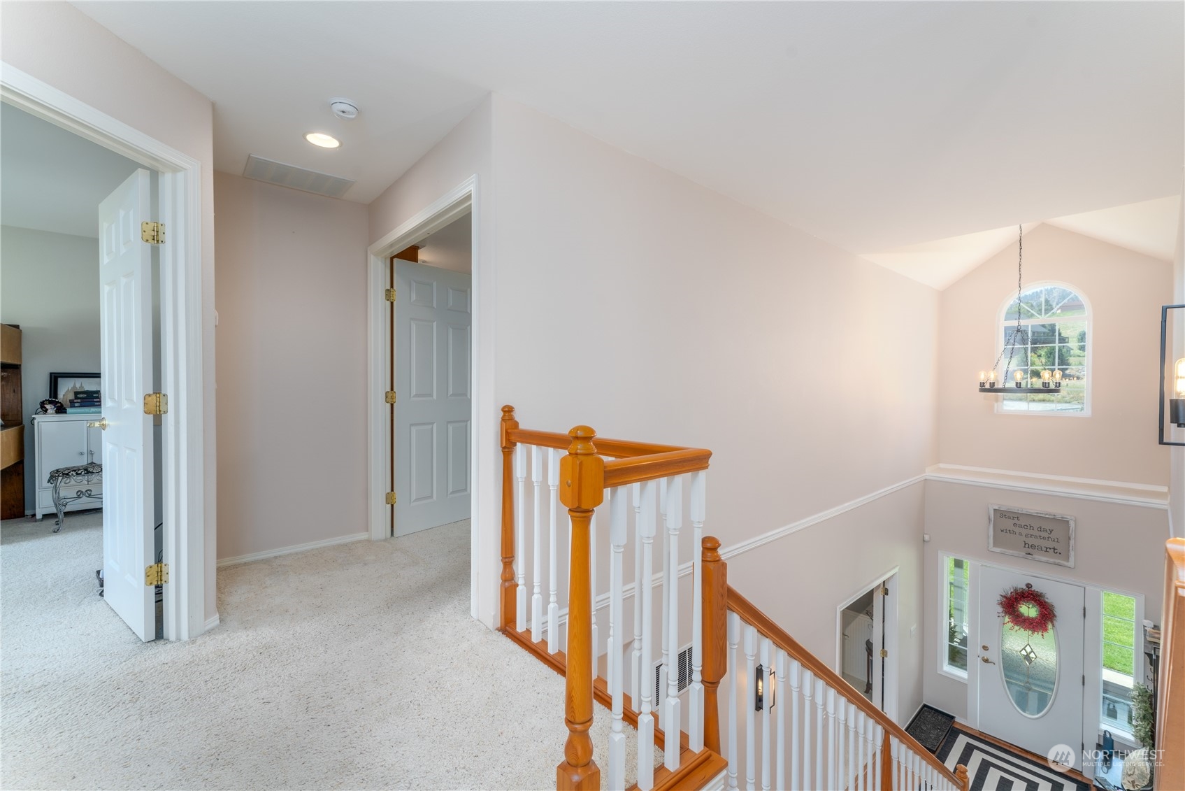 900 Loop Avenue Manson, WA 98831 - Photo 27 of 40 a view of a hallway with windows and stairs