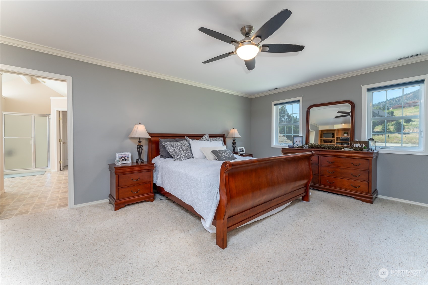 900 Loop Avenue Manson, WA 98831 - Photo 28 of 40 a bedroom with a bed and a large window