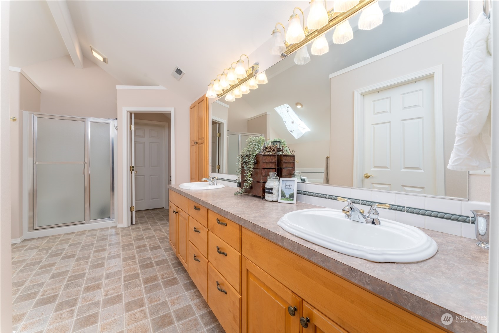 900 Loop Avenue Manson, WA 98831 - Photo 29 of 40 a spacious bathroom with a double vanity sink mirror and