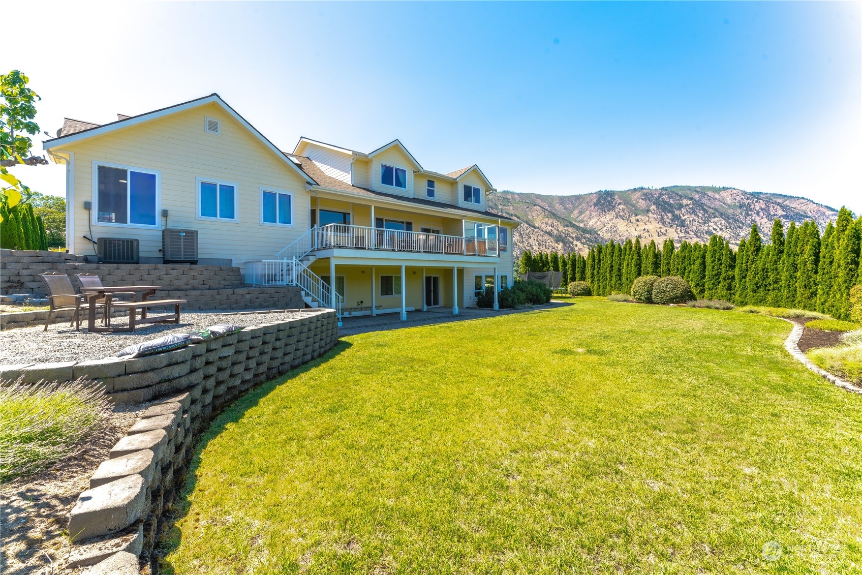 900 Loop Avenue Manson, WA 98831 - Photo 40 of 40 a view of a house with swimming pool