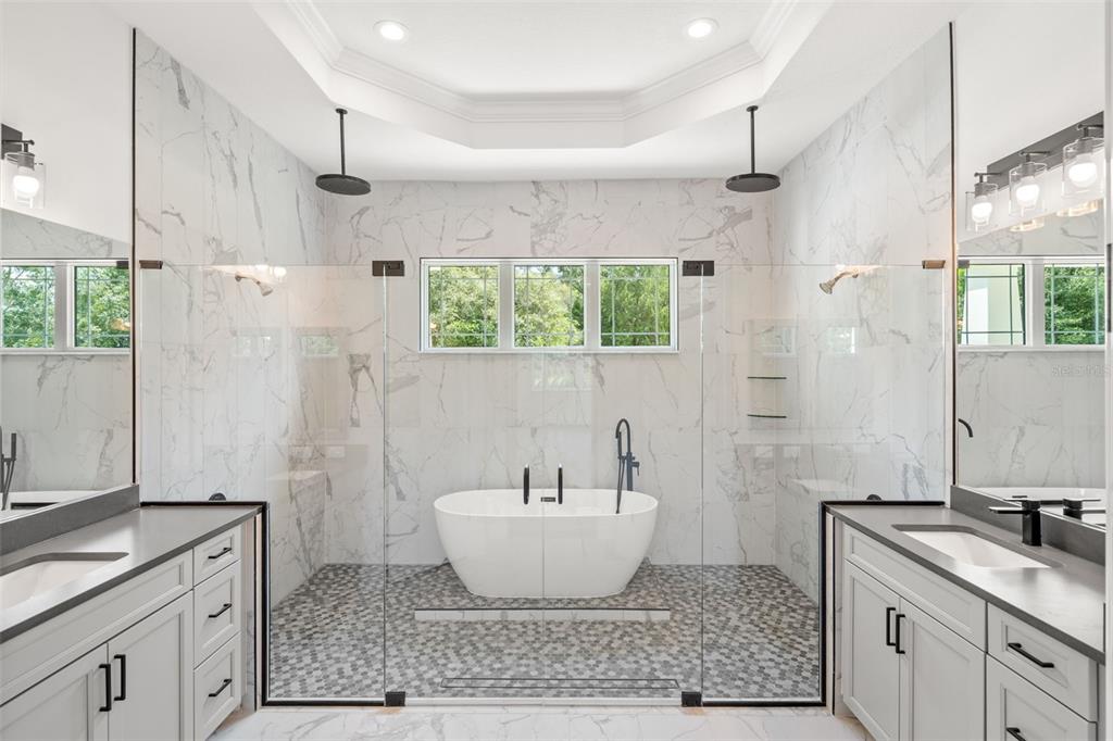 3 Plainview Road, Unit LOT 3 Odessa, FL 33556 - Photo 3 of 9 a bathroom with a granite countertop sink toilet and shower