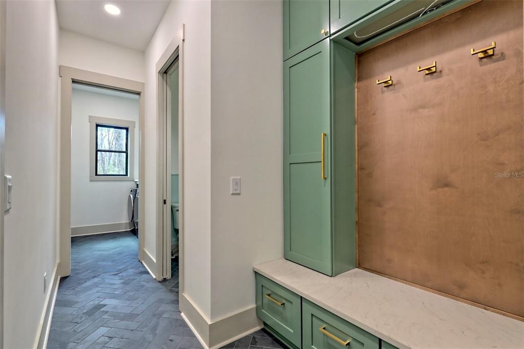 3 Plainview Road, Unit LOT 3 Odessa, FL 33556 - Photo 8 of 9 a view of a bathroom from a hallway