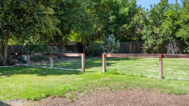 a backyard of a house with entertaining space
