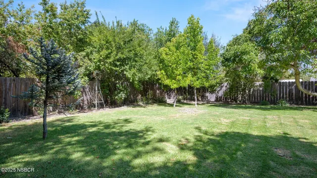 a fire hydrant in the middle of a field