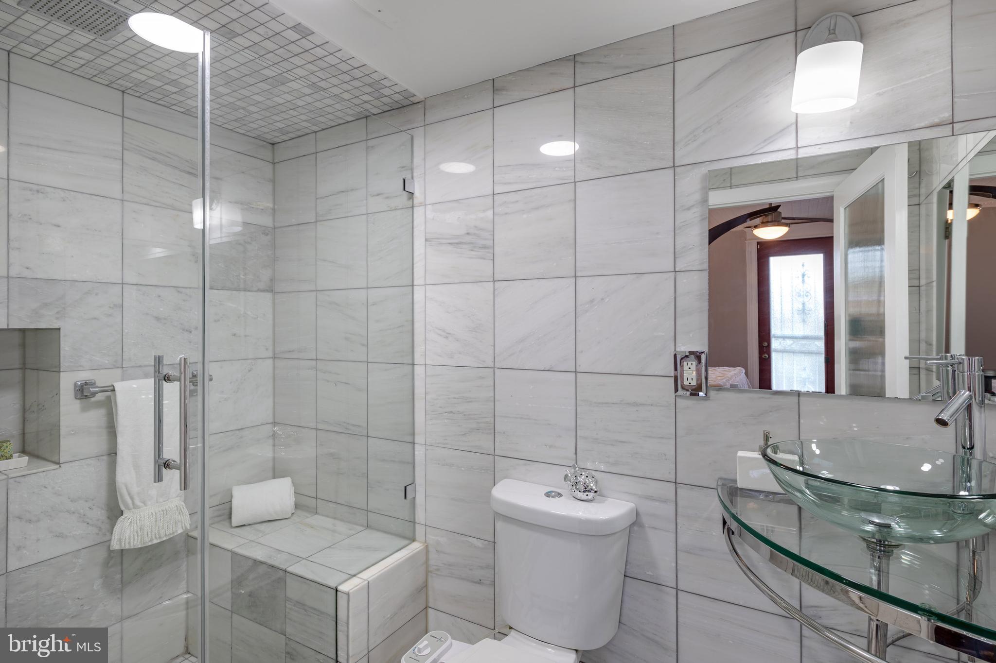 216 Rhode Island Avenue Northwest Washington, DC 20001 - Photo 16 of 28 Renovated bathroom in the primary suite.