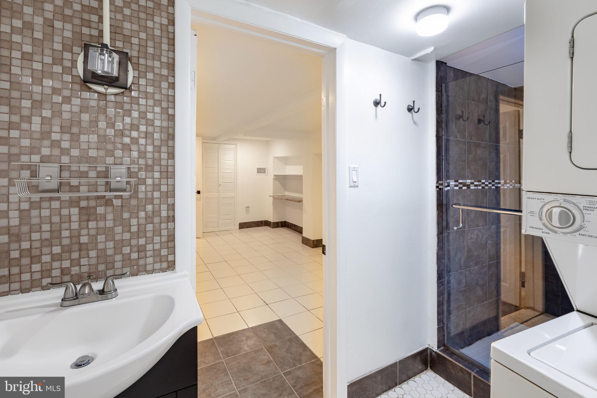 216 Rhode Island Avenue Northwest Washington, DC 20001 - Photo 25 of 28 In-law suite bathroom + laundry