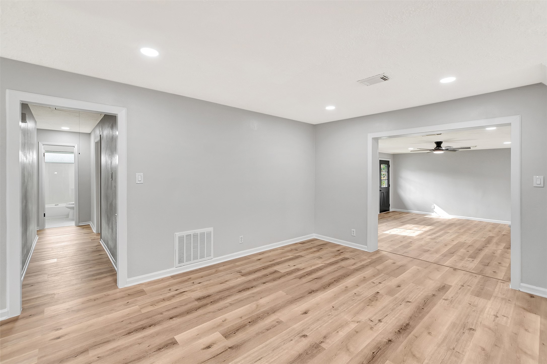 704 Teabury Street Pasadena, TX 77503 - Photo 12 of 43 a view of empty room with wooden floor