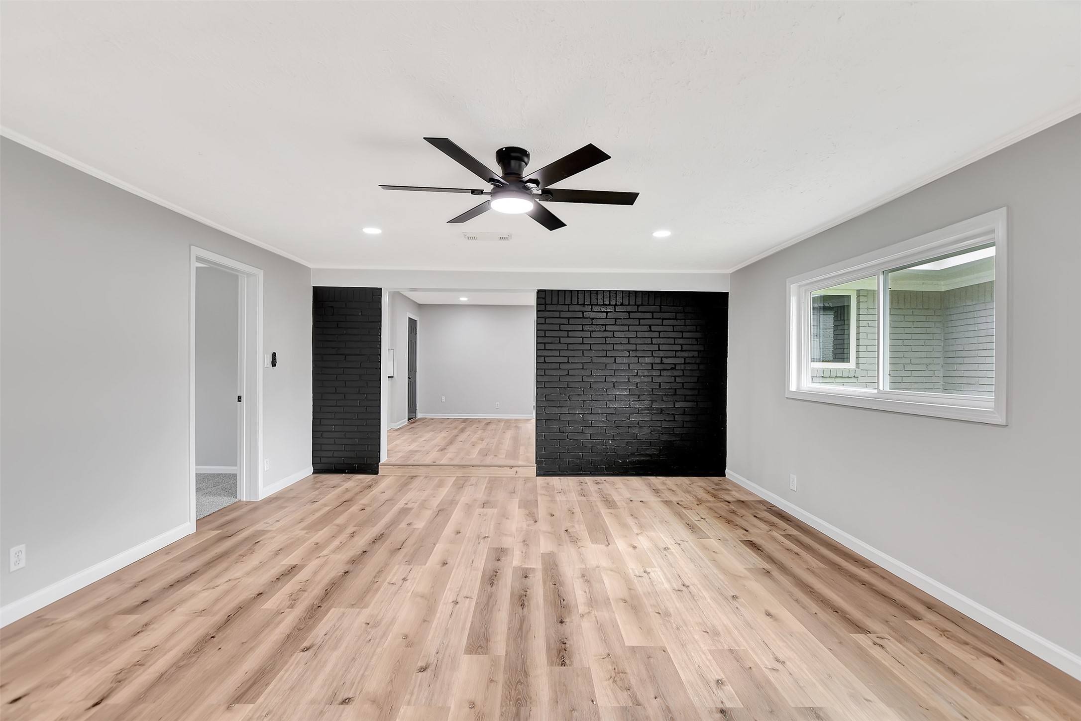 704 Teabury Street Pasadena, TX 77503 - Photo 19 of 43 a very nice looking room with a ceiling fan