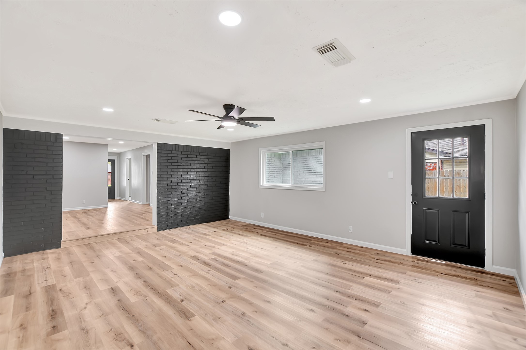 704 Teabury Street Pasadena, TX 77503 - Photo 21 of 43 a view of an empty room with a window