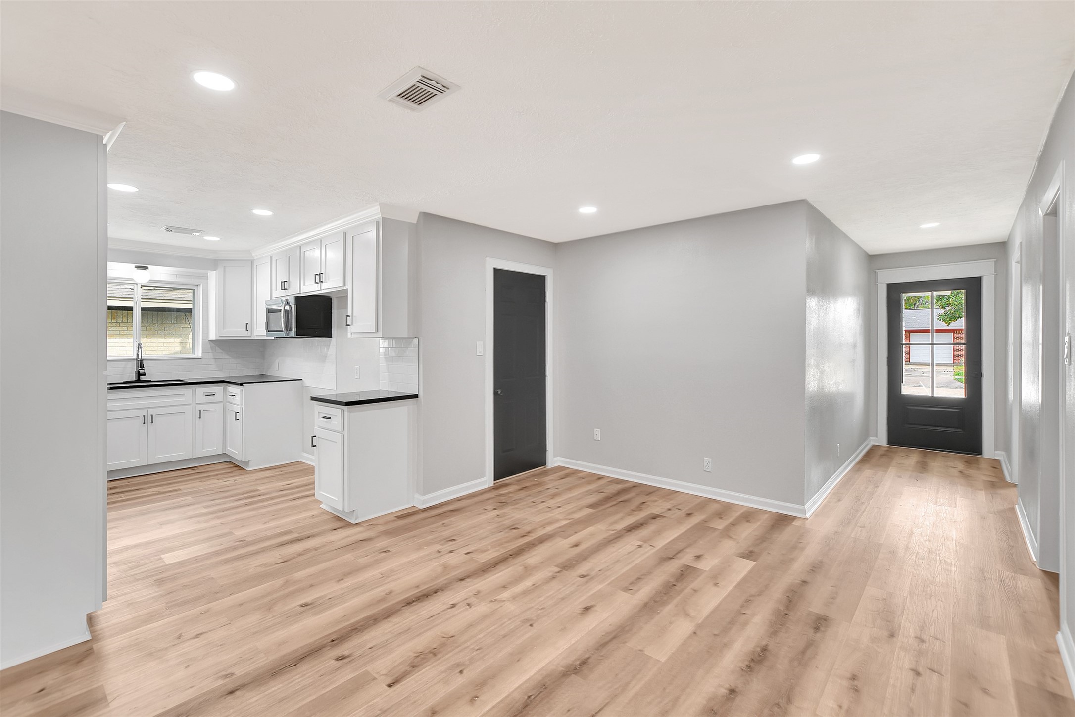 704 Teabury Street Pasadena, TX 77503 - Photo 8 of 43 a view of kitchen with wooden floor