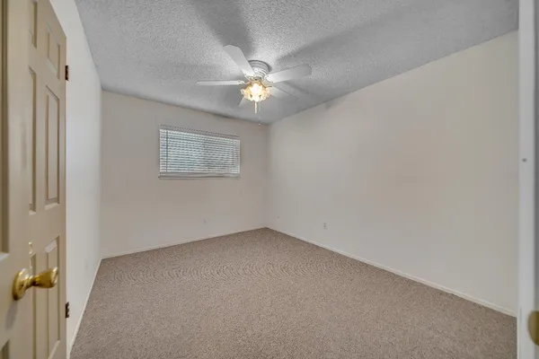 a view of closet with cabinet